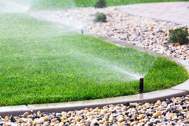 sprinklers watering lawn Edwardsville IL